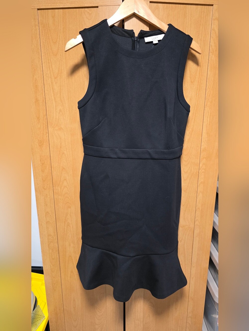 LOFT Black Sleeveless Sheath Dress with Flounce Hem Detail
